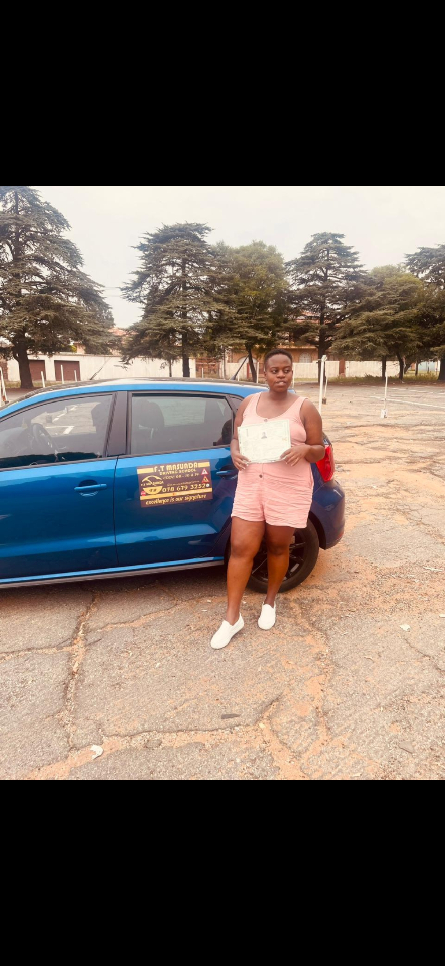 Student showing off her new South African drivers licence